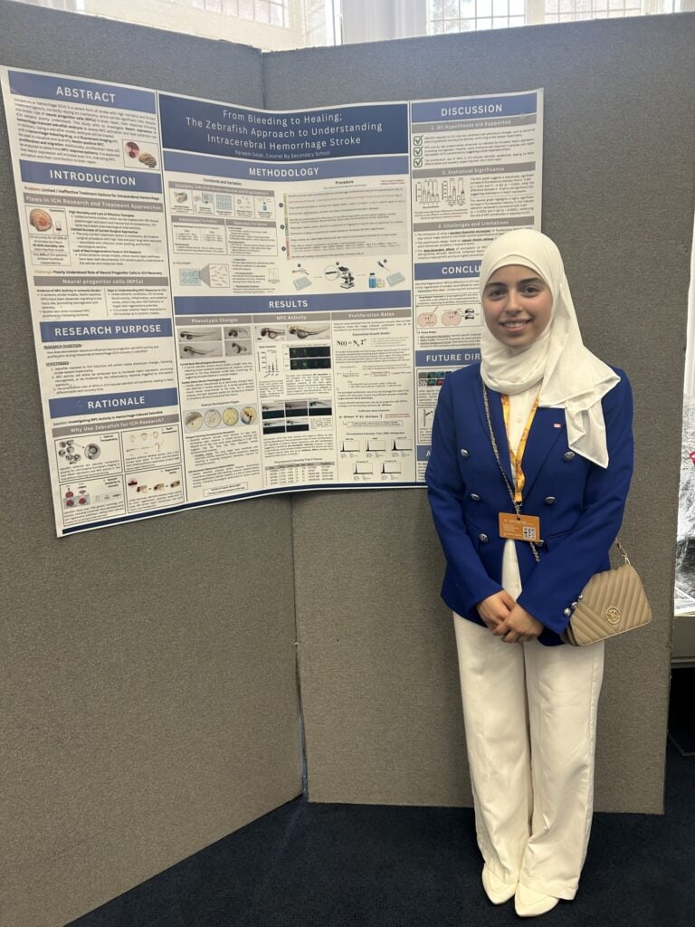 Innovative student presenting a science research poster at Youth Science Canada event focusing on STEM education and youth science achievements.